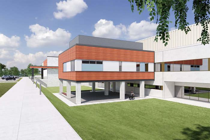 Rendering showing the hospital with a wood and white extension on raised block pillars jutting out